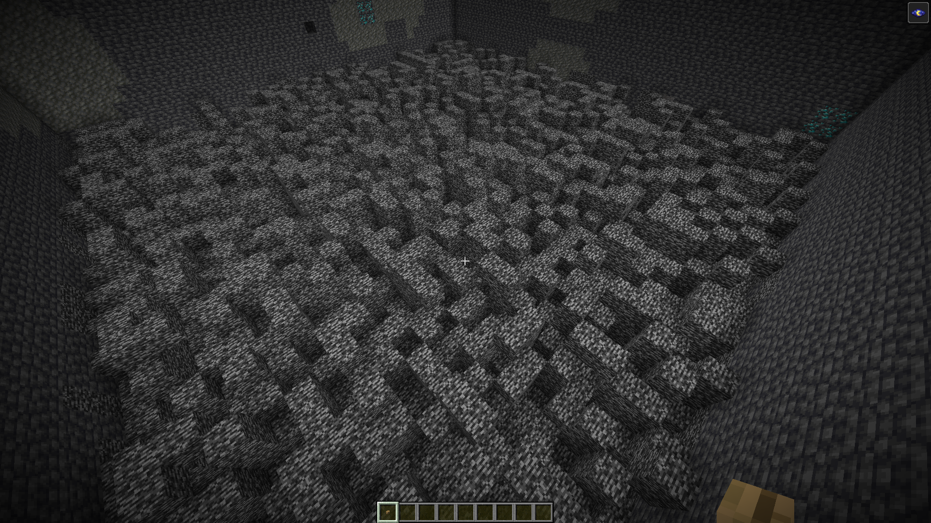 A screenshot of the bottom of the world with non-bedrock blocks removed. Bedrock forms a porous noise pattern due to random pillar height.