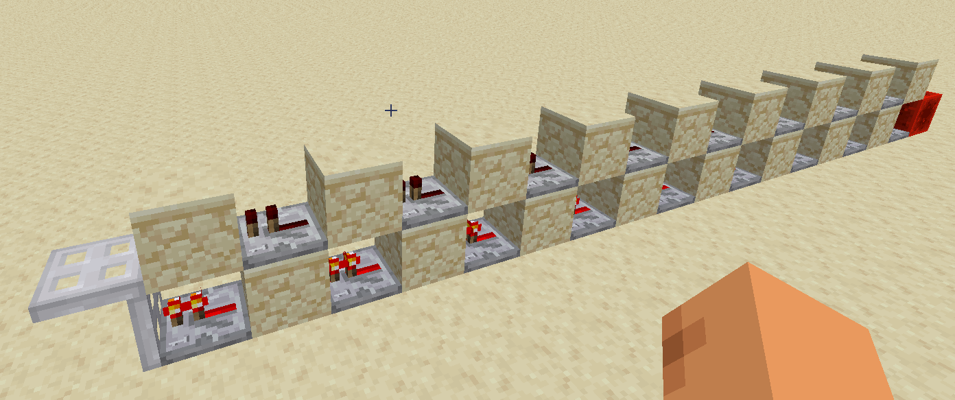 Two 1x1 repeater lines on top of each other. A repeater line is a line of blocks alternating between sandstone and repeaters. Lines are offset by one block, so that the repeaters of the top line stand on sandstone of the bottom line. The lines end with iron trapdoors.